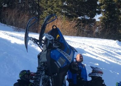 Always Peak Powder Club0A go snowmobile riding